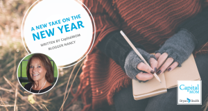 "A New Take on the New Year by CapitalMOM blogger Nancy" with photo of woman writing in a notebook.