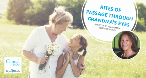 Grandma with young granddaughter in field
