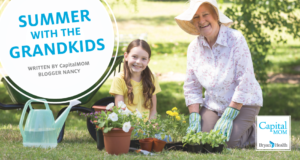 Young girl and grandma out in garden