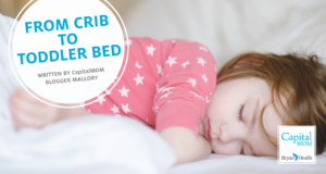 Little girl sleeping in bed