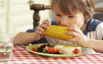 24 Ears of Corn, 1 Grandson, and a Happy Grandma