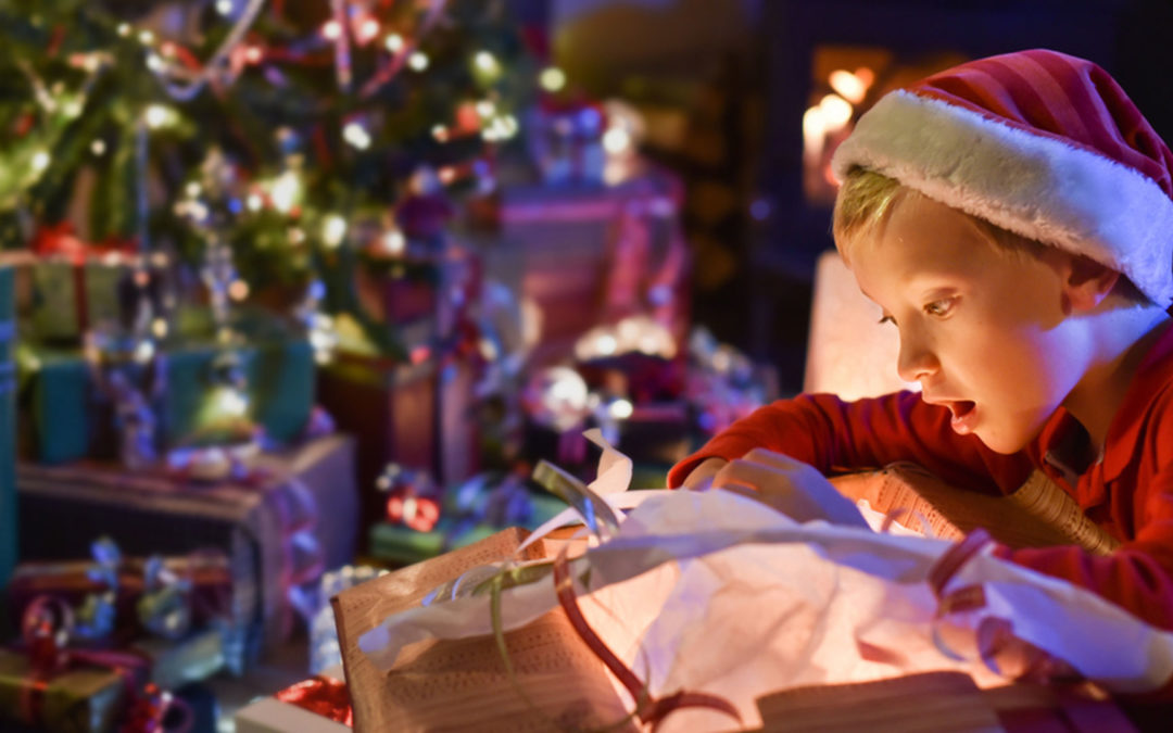 Child opening Christmas gift