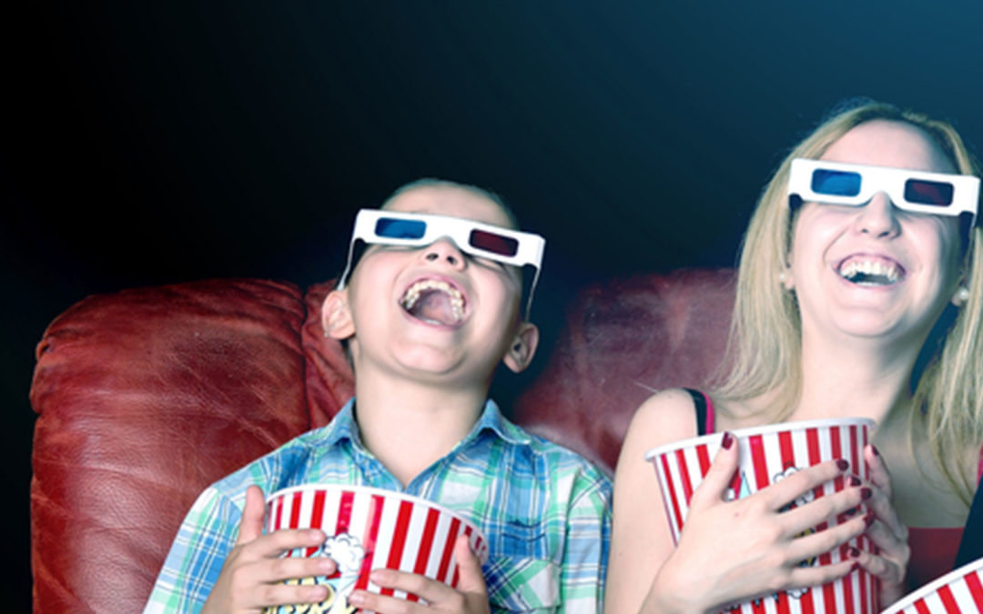 child watching movie with 3D glasses