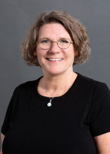 Headshot of Vicki Black wearing a black shirt