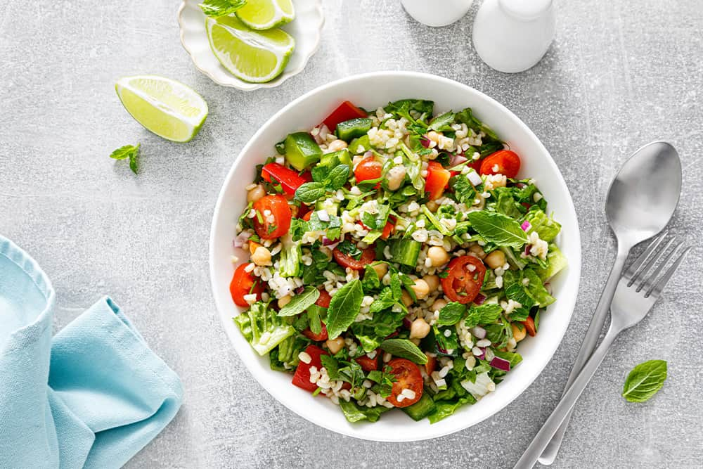 Taboule salad with fresh parsley, onions, tomatoes, bulgur and chicken feta.