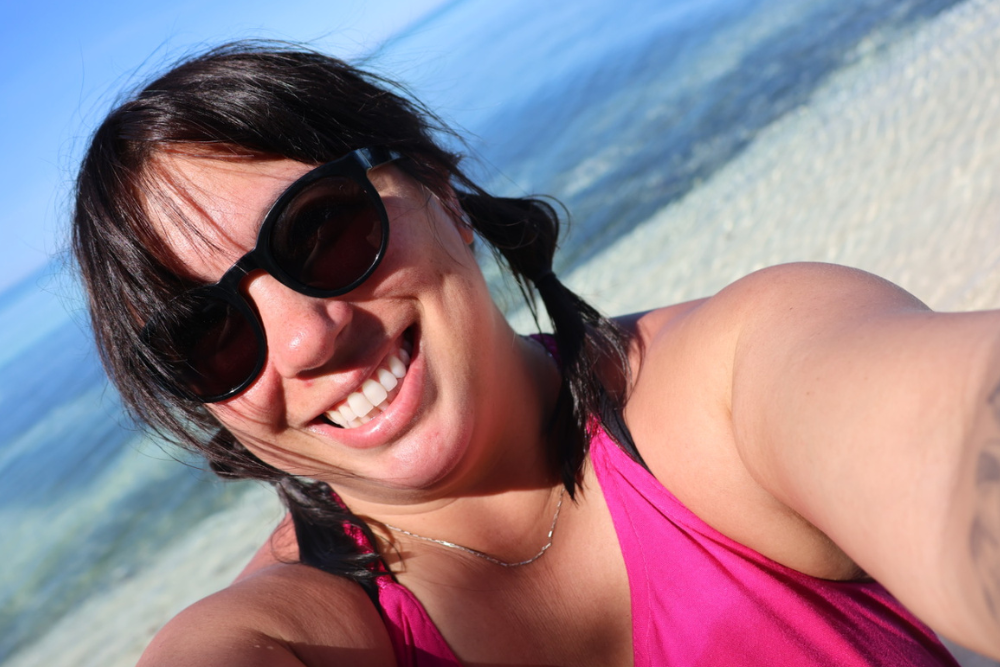 Cassidy enjoying the sun and the beach